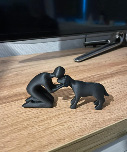 Figur des Besitzers mit Hund