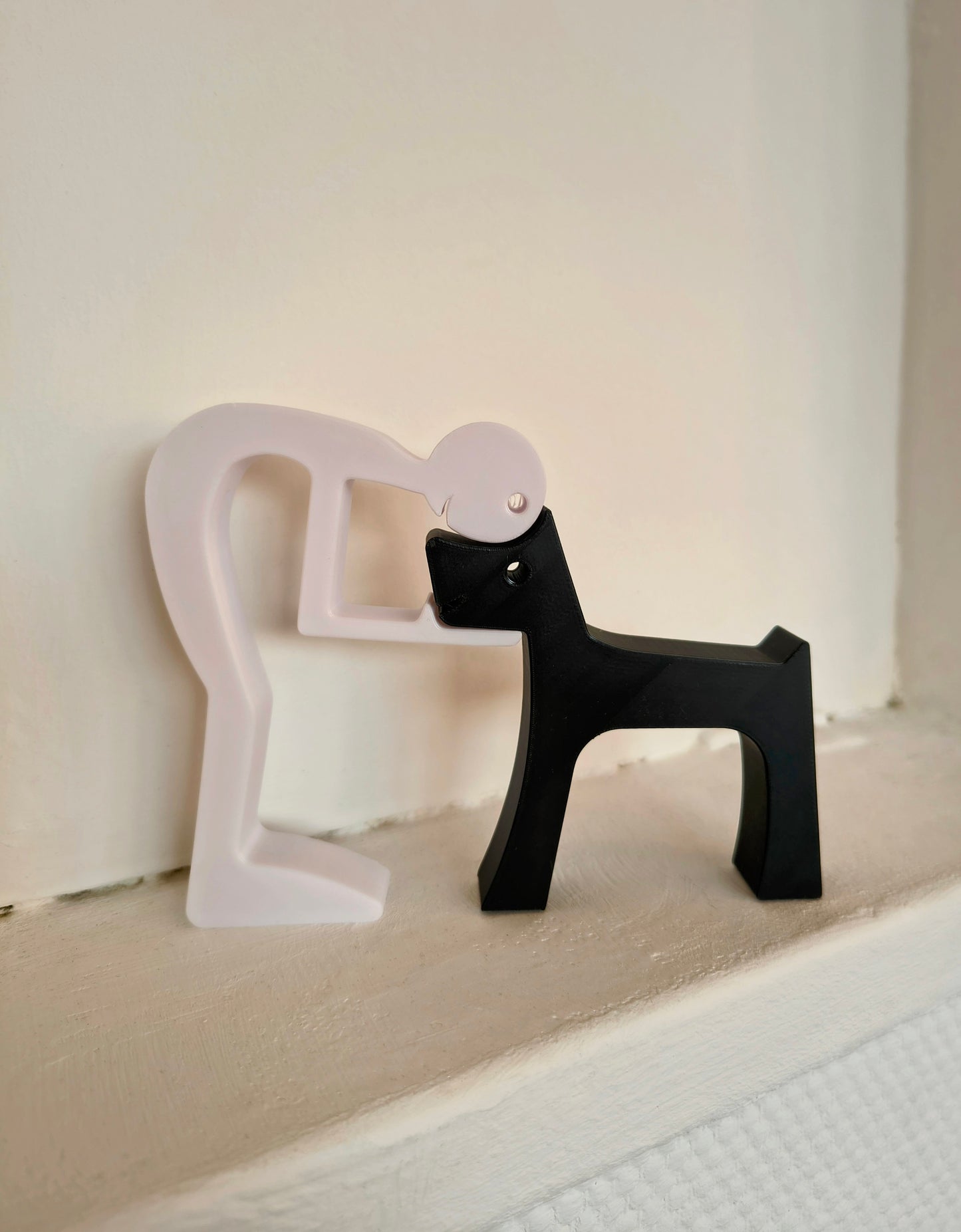 Puzzlefigur des Besitzers mit Hund